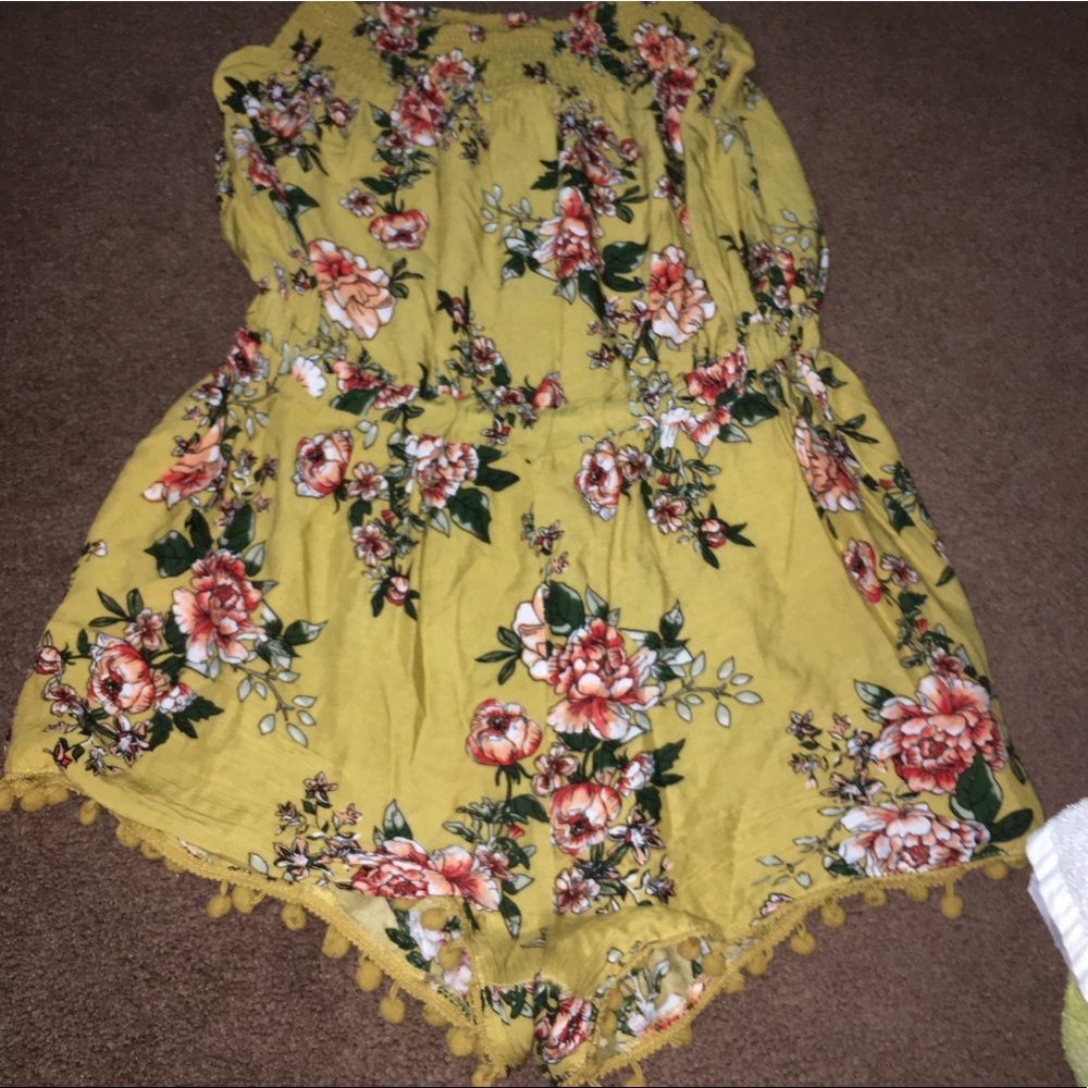 floral romper with dangly things